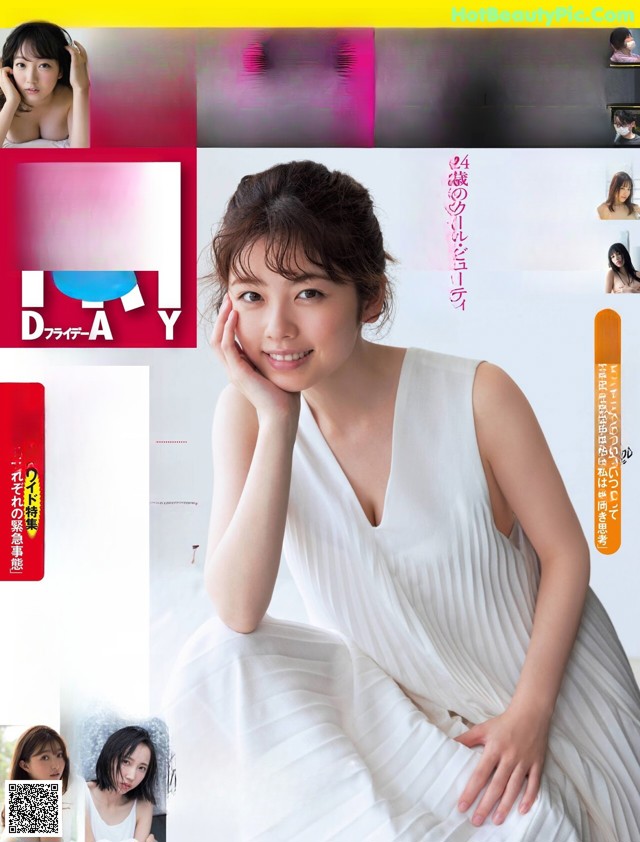 A woman in a white dress sitting on a magazine cover.