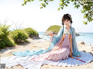 A woman in a white kimono standing in a park.