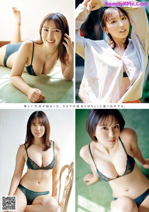 A woman in a blue bra and panties posing for a picture.